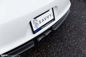 Выхлопные трубы по центру бампера