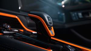 Чёрно-оранжевый салон Порше Панамера от ТечАрт